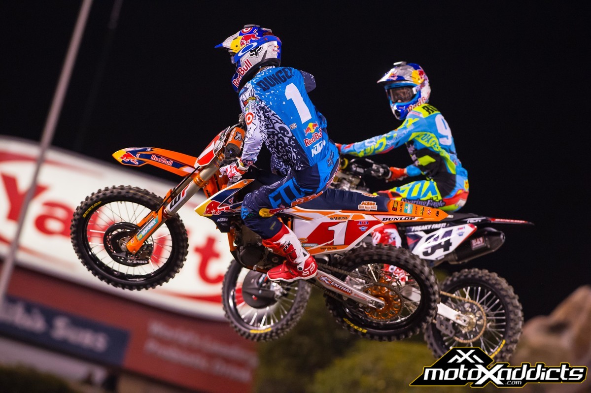 Ryan Dungey #1 and Ken Roczen #94 battling during their heat race at A2. Ryan already has a 21-point lead over Kenny in the Championship. Photo by: Simon Cudby